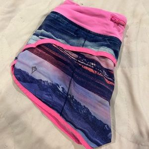 Ivviva mountain shorts for little girls. Around the 10-12 age division.